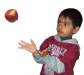 Boy catching apple.jpg